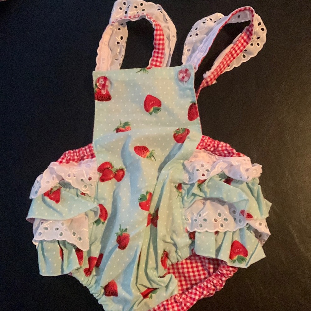 12 month strawberry onesie.